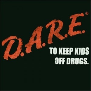 Fifth-grader pays close attention to D.A.R.E. officer